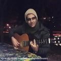 عکس اجرای آهنگ در این دنیا با گیتار توسط حسین دهقان