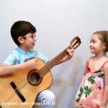 عکس ویدیو زیبا ازگیتار نوازی و خوانندگی دو تا پسر و دختربچه