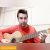 عکس اجرای بسیار زیبای گیتار توسط آقای امیر کریمی